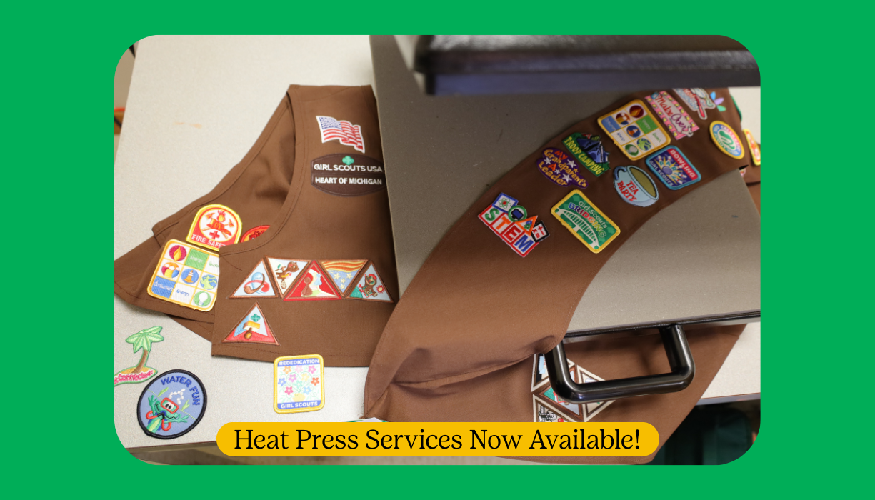 Brownie uniform being heat pressed